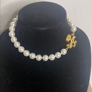 Tory Burch Roxanne pearl necklace with a gold-tone logo charm